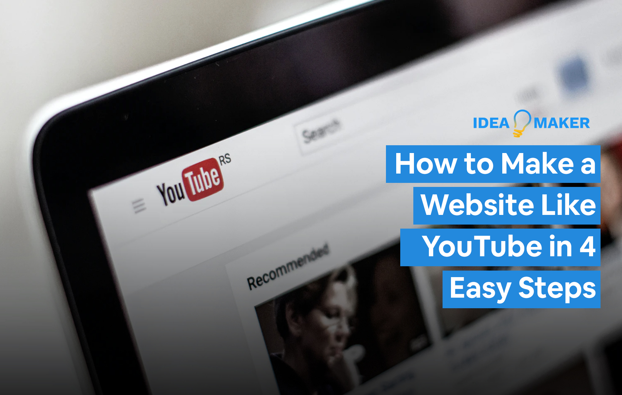 A computer screen on the YouTube Page with text: How to Make a Website Like YouTube in 4 Easy Steps
