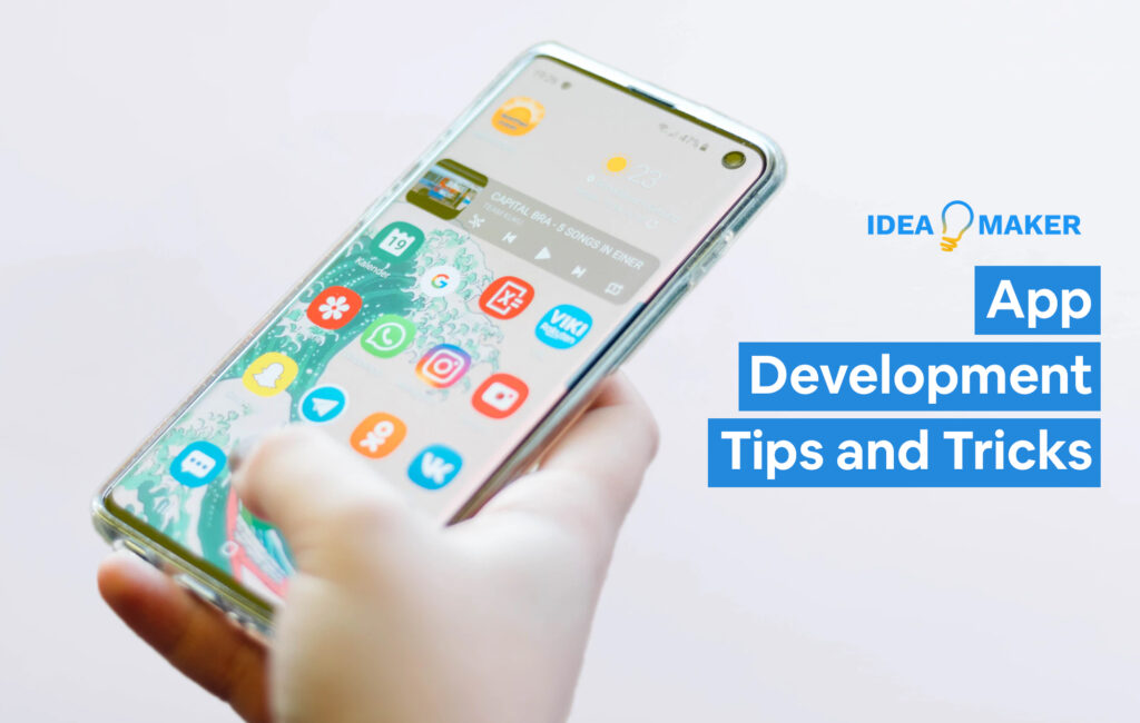 Someone holding an app with text: App Development Tips and Tricks